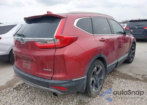 2019 Honda Cr-V Touring z USA, uszkodzony, nr VIN 5J6RW1H92KL004111